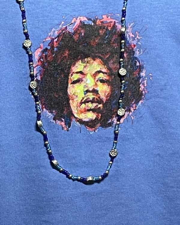 detail T-shirt Jimi Hendrix bijou plexus